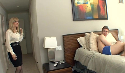 Danny Wylde screwing a busty cougar in stockings Nina Hartley