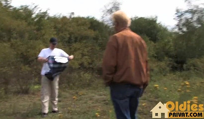 Mature German brunette sucking and fucking on a picnic