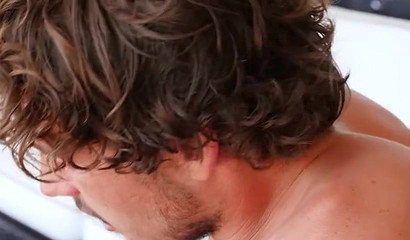 Milf with big fake tits goes down on a stud