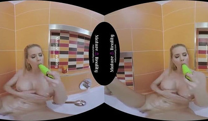 Big boobed Mommy having fun with her dildo