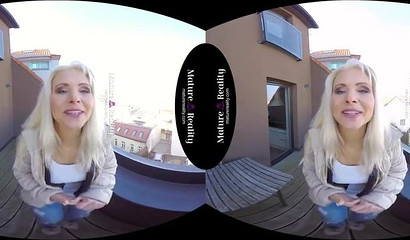 Kathy Anderson with natural tits rides cock in VR