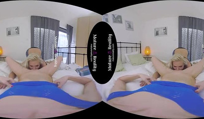 Kathy Anderson with natural tits rides cock in VR
