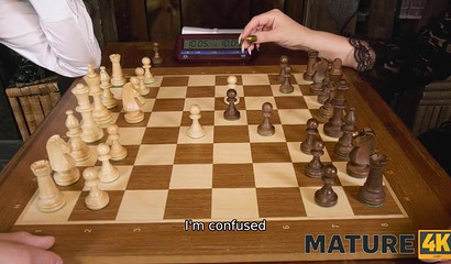 Mature redhead loses a chess game and has to satisfy her opponent