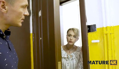 Milf worker fucks her client in his future home