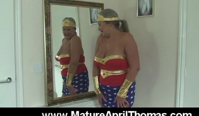 Mature slut masturbates as a Wonder Woman