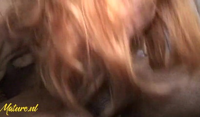 American momma chokes on his big black cock