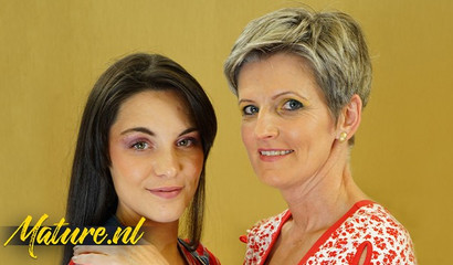 Old lady with small tits fucks a young lesbian