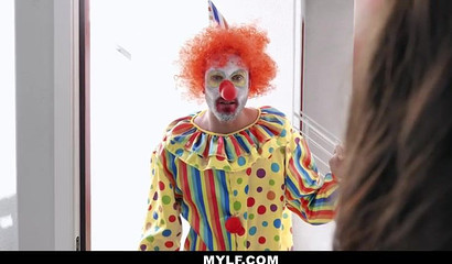 Horny milf with bangs goes down on a clown